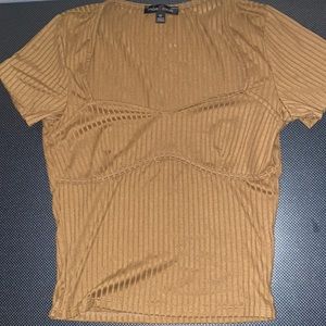 The shirt is lightweight and is low on the chest area